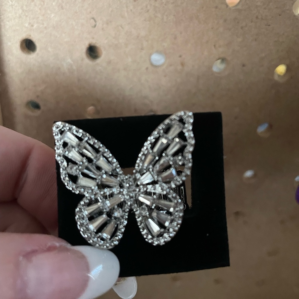 Large rhinestone butterfly cocktail ring. Stretchy back.